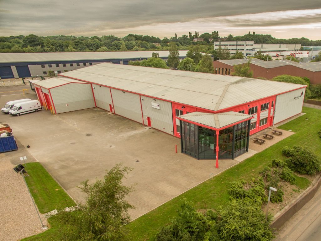 Aerial drone photograph of a commercial industrial building